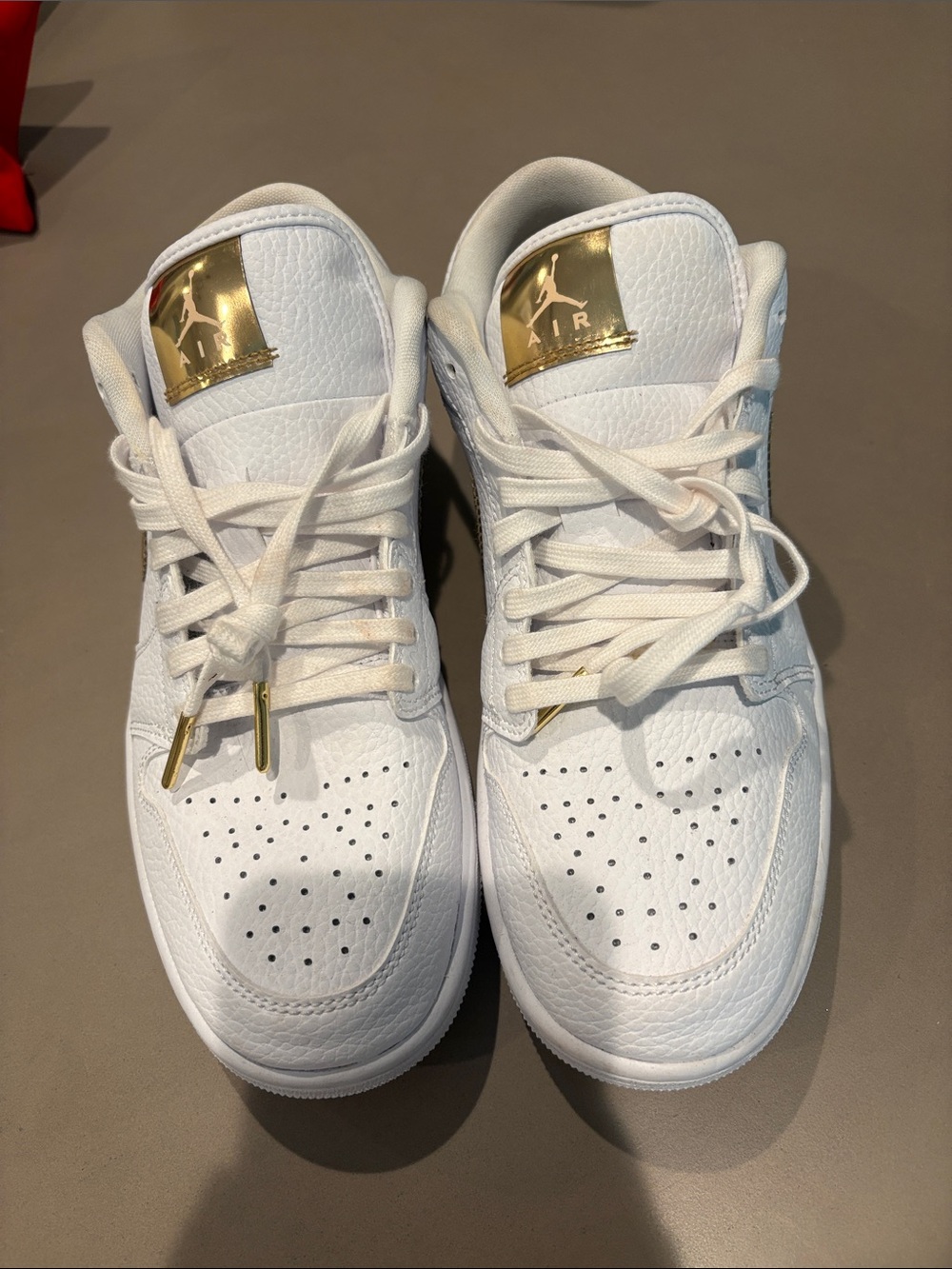 Nike Air Jordan 1 Low White with Gold Accents